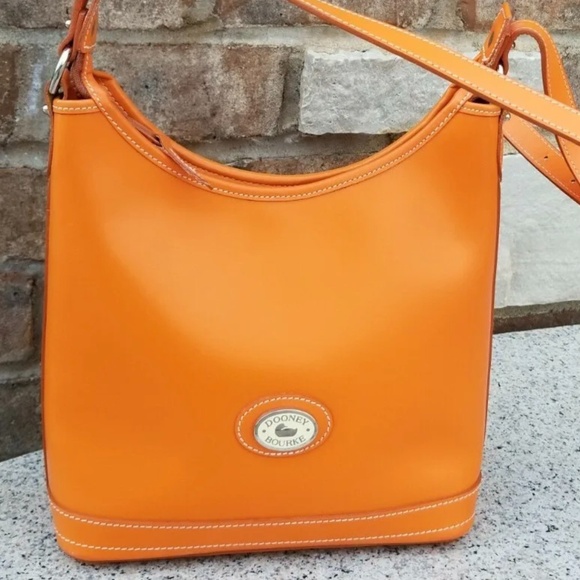 Dooney & Bourke Handbags - Dooney and Bourke Shoulder bag Orange. Good preowned conditions.